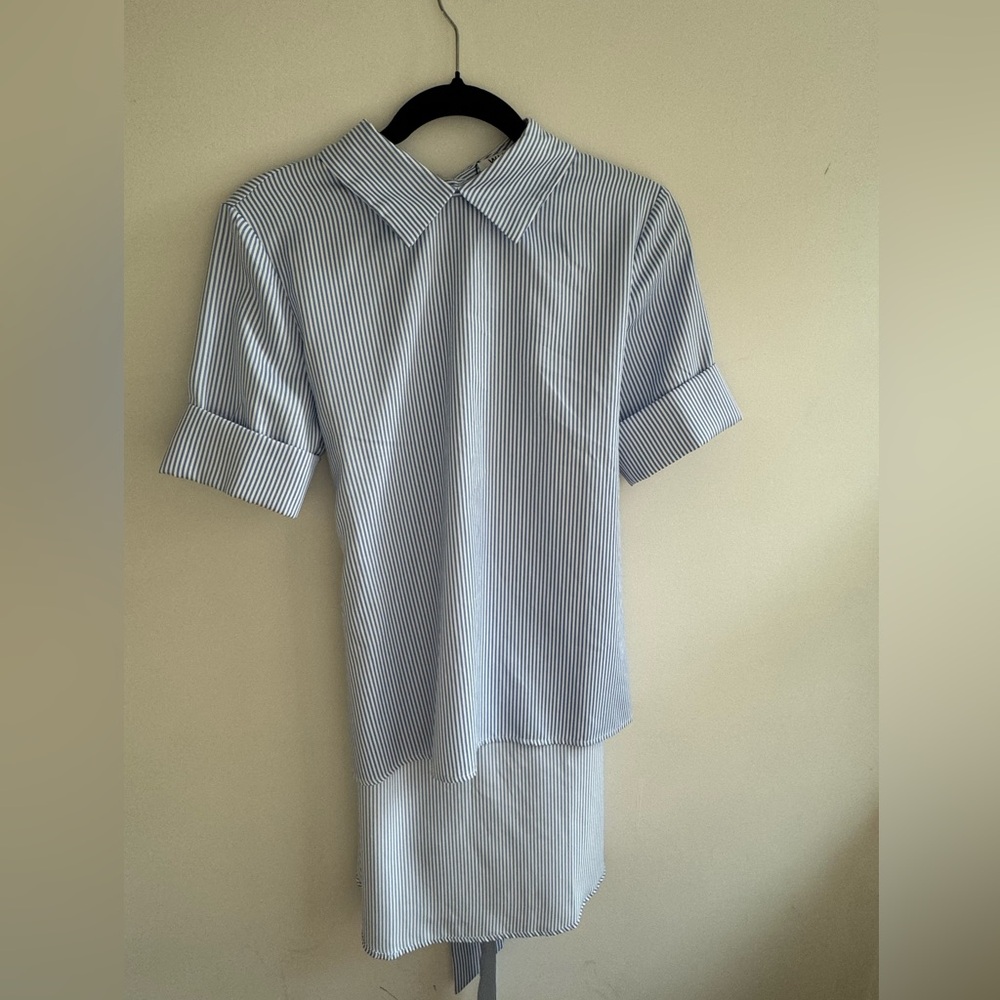 Size S dress can also be worn as a shirt. Blue and white.